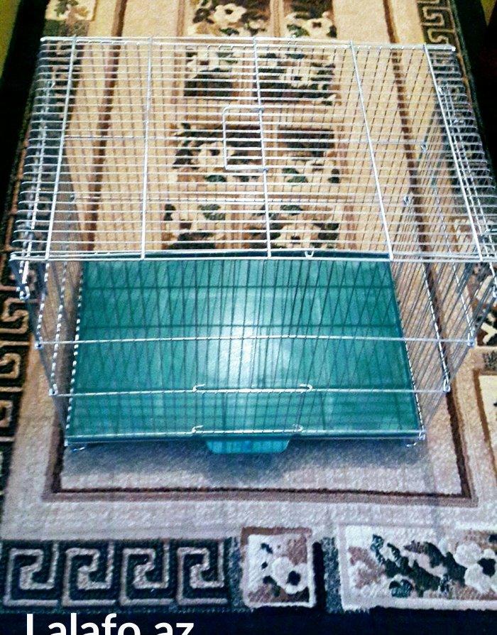 Teze iri qefes satilir. ON terefden ve Yan terefden Qapisi acilir. Olc